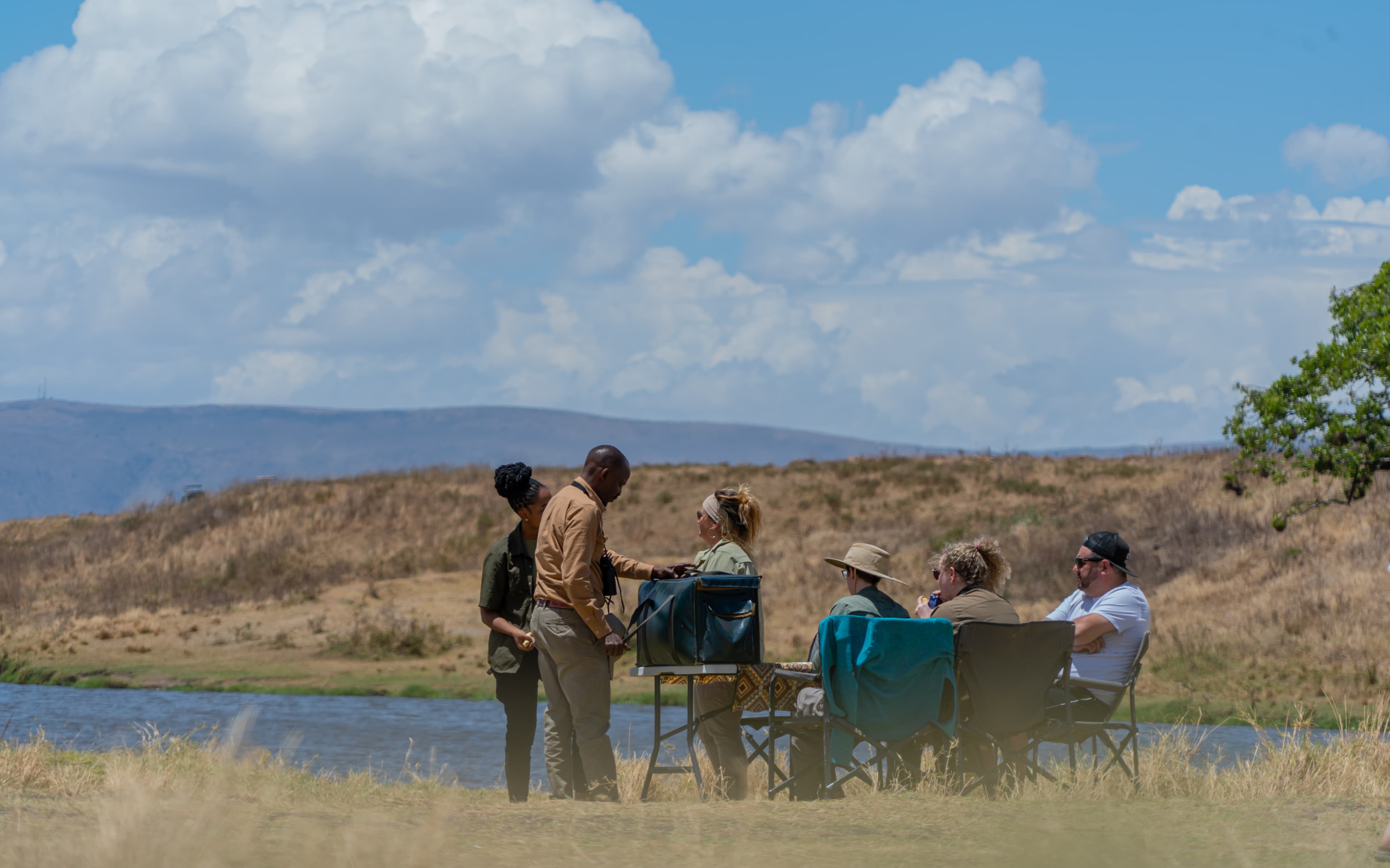 Local guide with travellers in Tanzania